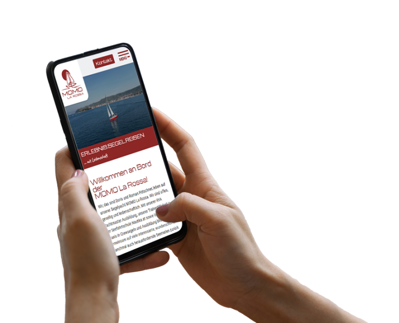 Hand h&auml;lt Smartphone, darauf ist ein Screenshot der Website zu sehen