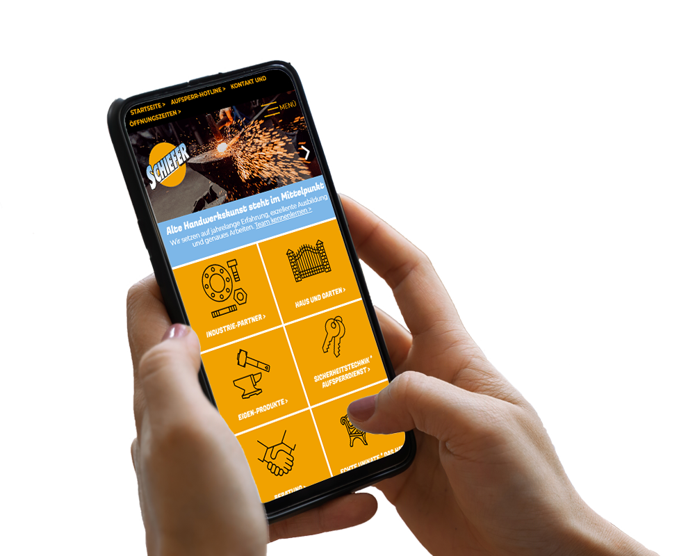 Hand hält Smartphone, darauf ist ein Screenshot der Website zu sehen